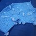 Sciarpa neonato azzurra con pompom