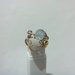 Pietra naturale ,anello perle di cristallo con riflessi cangianti coccolate da ghirigori multicolori
