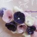 Ciondolo con perla e fiori rosa, bianchi e viola in pasta di mais