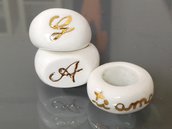 anelli in ceramica e oro con scritte personalizzabili ("ti amo", nomi o iniziali). Ceramic rings "I love you", "name" or "monogram"