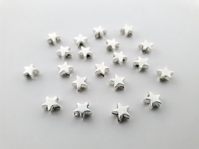 10 Perline Stella Distanziatori - Argento tibetano (6mm) 10 Perline Stella Distanziatori - Argento tibetano (6mm)