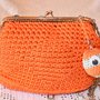 Pochette all'uncinetto con chiusura clic clac arancio