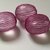 Perline nylon trasparenti con intreccio viola ovali