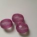 Perline nylon trasparenti con intreccio viola ovali