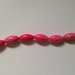 Perline in howlite tinta rosa forma oliva