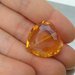 Mezzo cristallo forma cuore ambra