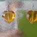 Orecchini in cristallo forma cuore colore giallo ambra