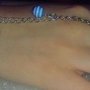 BRACCIALE *CON ANELLO* CON PERLE DI RESINA CON STRISCE BIANCHE