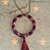 Collana vintage con pendente all'uncinetto e nappina 