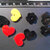 (206) Lotto 8 ciondolini a cuore colori misti in plexiglass