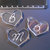 (166) Lotto 3 ciondoli a cuore in plexiglass trasparente con incisione